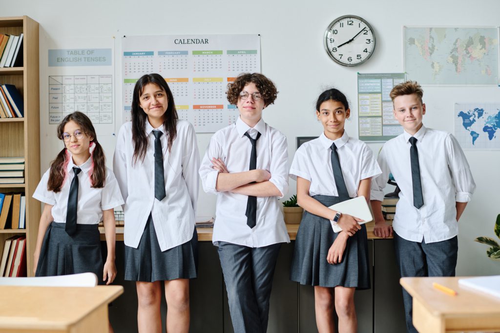 School children standing in the classroom
